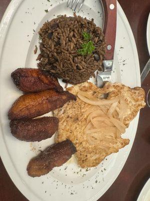 Grilled chicken breast with a side of sweet plantains and Moro