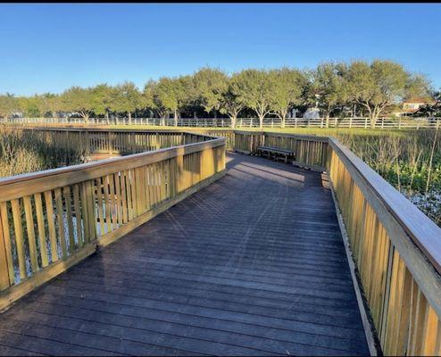 Hiking trail bridge across the pond