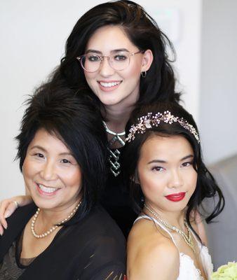 Makeup artist Micheii with bride and mother