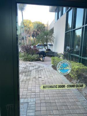 Homeless man picking up trash.  I asked if he worked here or was doing community service. He said he was tired of seeing it so dirty here.