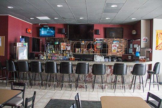 Full service restaurant, fully stocked bar, and concessions