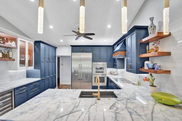 A nod to South Florida's nautical feel, this kitchen features calming colors, matched with upgraded appliances and cabinetry.