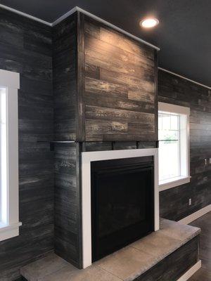 Engineered hardwood used as interior wall siding. *Material provided to builder