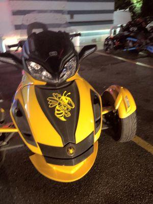 Bumblebee tri so cool - parked with others on side of ice cream parlor