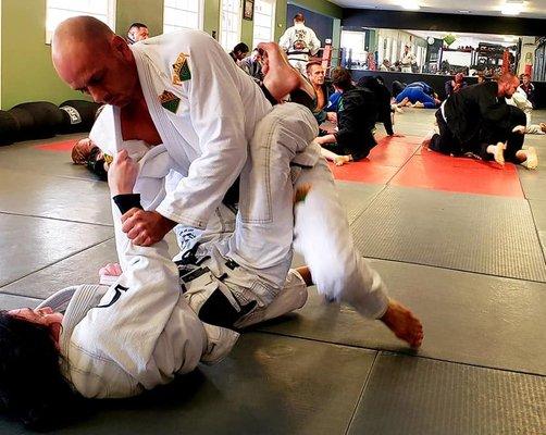 Mr. David Dunn being hands on with his Jiu-Jitsu training.