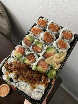 Spicy tuna, avocado salmon and shrimp tempura on the bottom