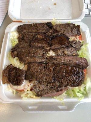 Top Sirloin over salad