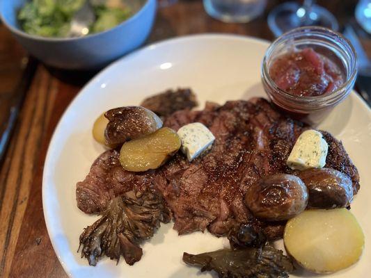 Ribeye with smoked potatoes and maitake mushrooms