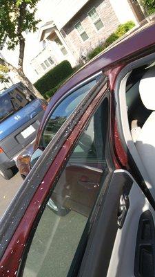 Polish dust and drips left all over my car after paint job at Sherwood Auto Body. Crinkle left in chrome strip on trunk.