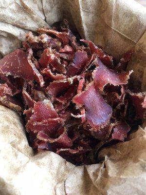 Beef biltong, medium and thinly sliced.