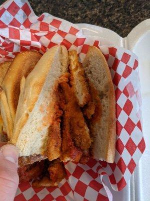 A pretty empty chicken parm sandwich.