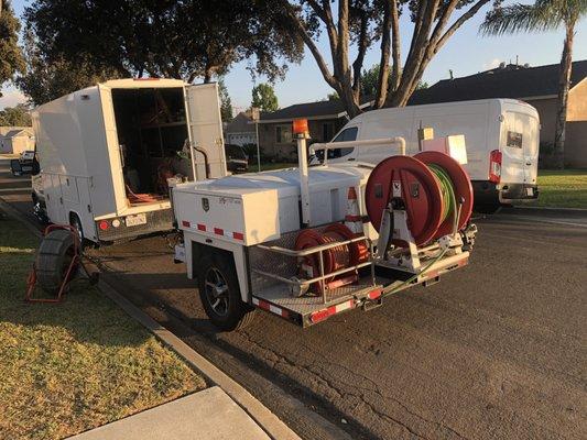 Our large commercial pull behind trailer Hydro-Jetter used for clearing tough drain clogs.