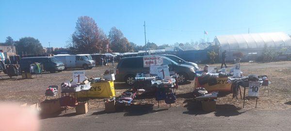 Gifts, Socks $1, comics wool socks,leather gloves,lighters, baseball caps,phone cases, bins of $1 stuff.