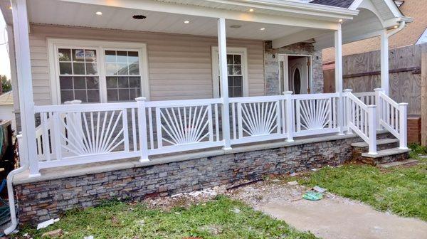 We fabricated and designed custom 36" PVC sunburst railings; installed on this home's front porch in Laurelton, Queens, NY.