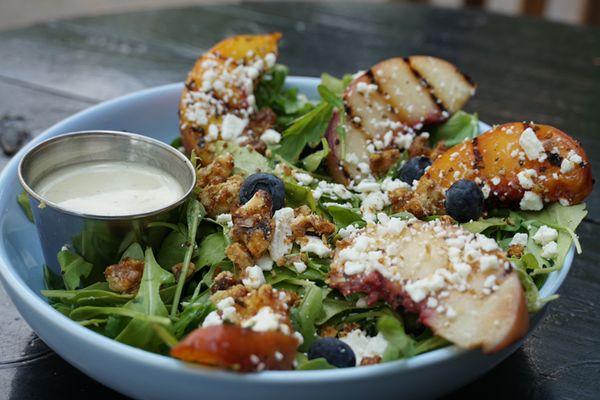 Grilled peach salad with lemon honey vinaigrette