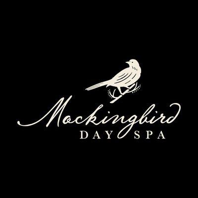 Mockingbird Day Spa logo featuring a minimalist illustration of a mockingbird perched on a branch, paired with elegant, cursi...