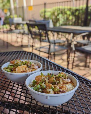 Shrimp and grits - get them with cheese, peppers, onions, and fried egg.