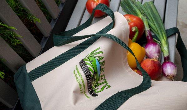 A Markets at Shrewsbury tote bag filled with produce from Glick's Produce.