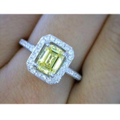 Emerald cut , yellow diamond engagement ring