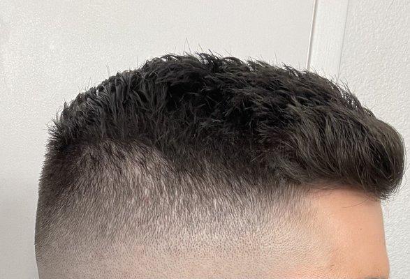 Mid- high skin tight fade + all over cut, shampoo and style by Tri