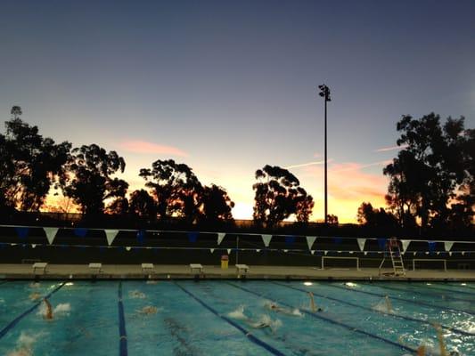 Morning practice and beautiful sunrise at Woollett Aquatic Center next door to Irvine High School.