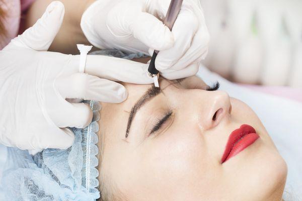 Consultation includes shape & color followed by numbing before the microblading procedure.