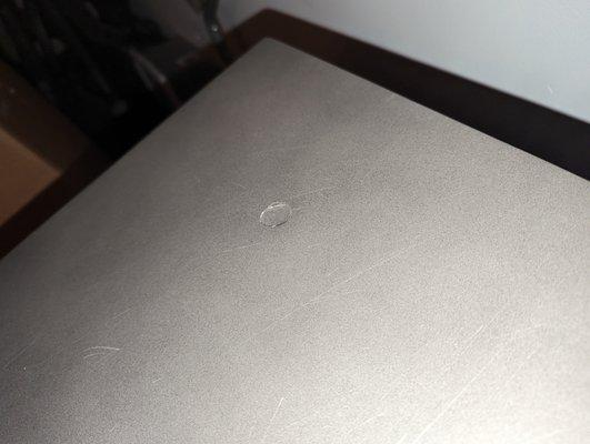 Scratched up and dented dresser top