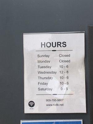 Library hours posted on front door