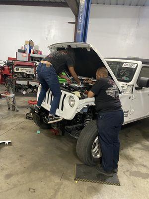 Mechanics working on my jeep