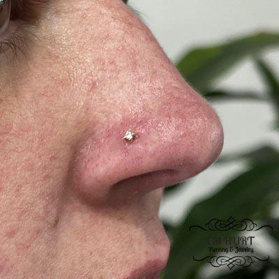 A genuine diamond to add that sparkle. Fresh sterile needle piercing.