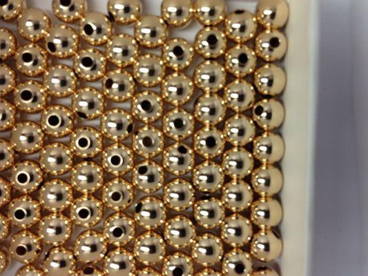 14k gold filled beads made in the USA of highest quality seamless smooth as well as textured varieties