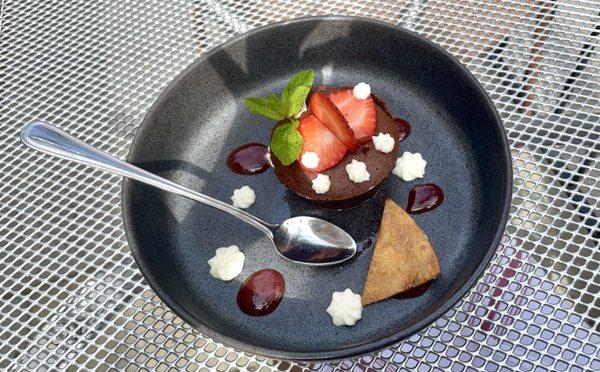 Chocolate cake with a sugary tortilla chip