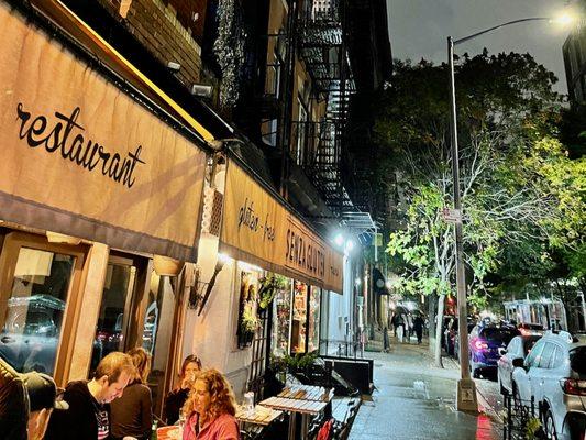 Right on Sullivan Street. As of October 18, you can still eat outdoors