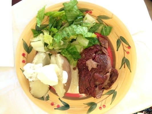 Candlelight dinner: filet mignon, baked potato, Nd homemade Caesar salad made table side by the Administrator.