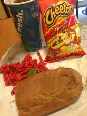 You know your Mexican when you eat your sandwich with hot Cheetos lmao