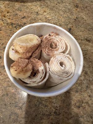 Banana ice cream rolls with crushed cookie