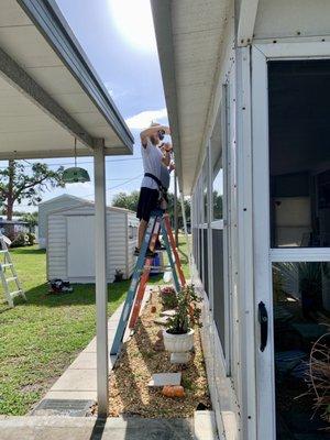 The crew removing my old gutters