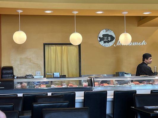 Sushi bar with sushi chef