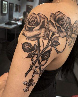 Rose tattoo by Elvia Guadian