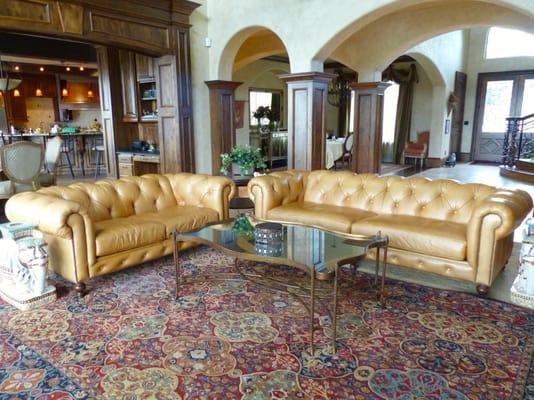 Two of our SoHo Styled Chesterfield sofas in a beautiful fawn colored leather.