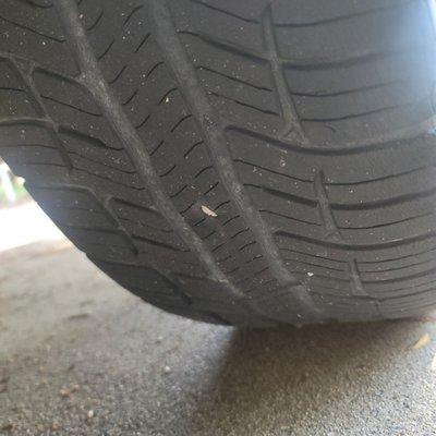 Tire of my car with piece of metal in it.