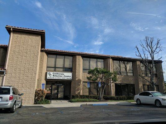 Front of building. Elevator to the 2nd floor on the outside of the building (located left in the image)