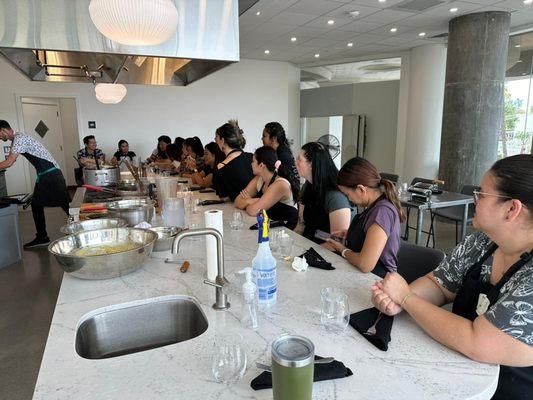 Gathered in anticipation to learn to make pasta....