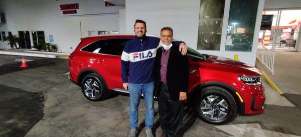 My brand-new KIA SORENTO S HYBRID with my SALESMAN MAX.