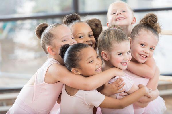 A group hug after dance class at Cynthia's Dance Center.