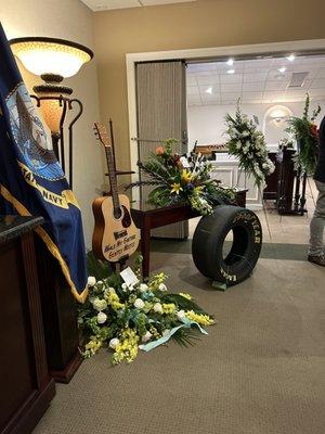 What we got-Tire sitting OUTSIDE of the flower arrangement.