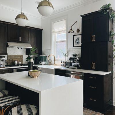 Roman shades provide a custom look in this kitchen, still letting in the beautiful natural light, but offering a soft feel and privacy