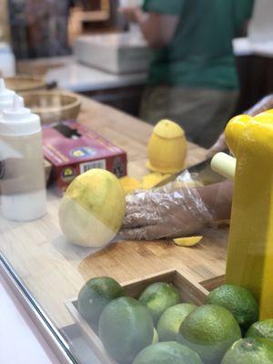 Mango slices being prepared