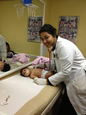 Dr. De Silva sees newborns at the hospital and office.