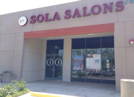 In front of Sola Salon Studios